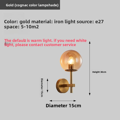 Ösedum Orb Brass Wall Sconce