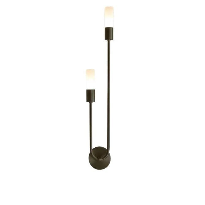 Long bedside wall lamp in the bedroom
