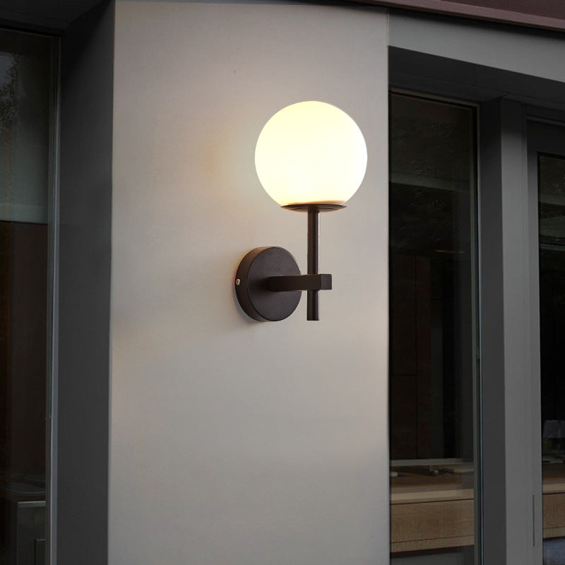 Ösedum Orb Brass Wall Sconce