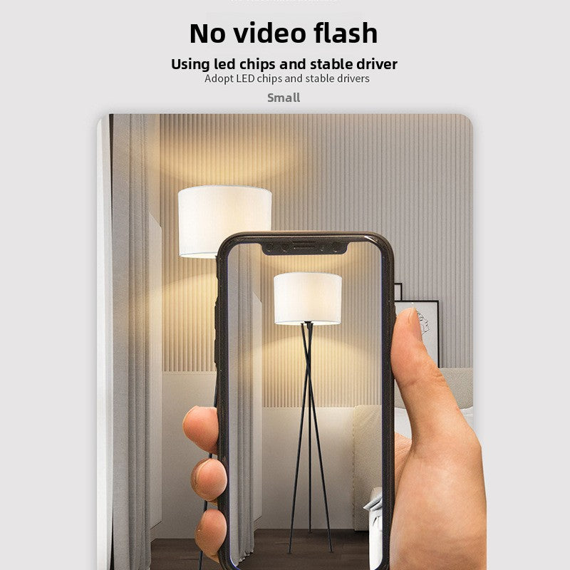 Three-legged floor lamp
