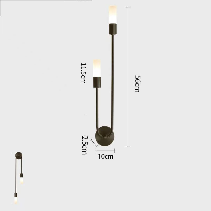 Long bedside wall lamp in the bedroom