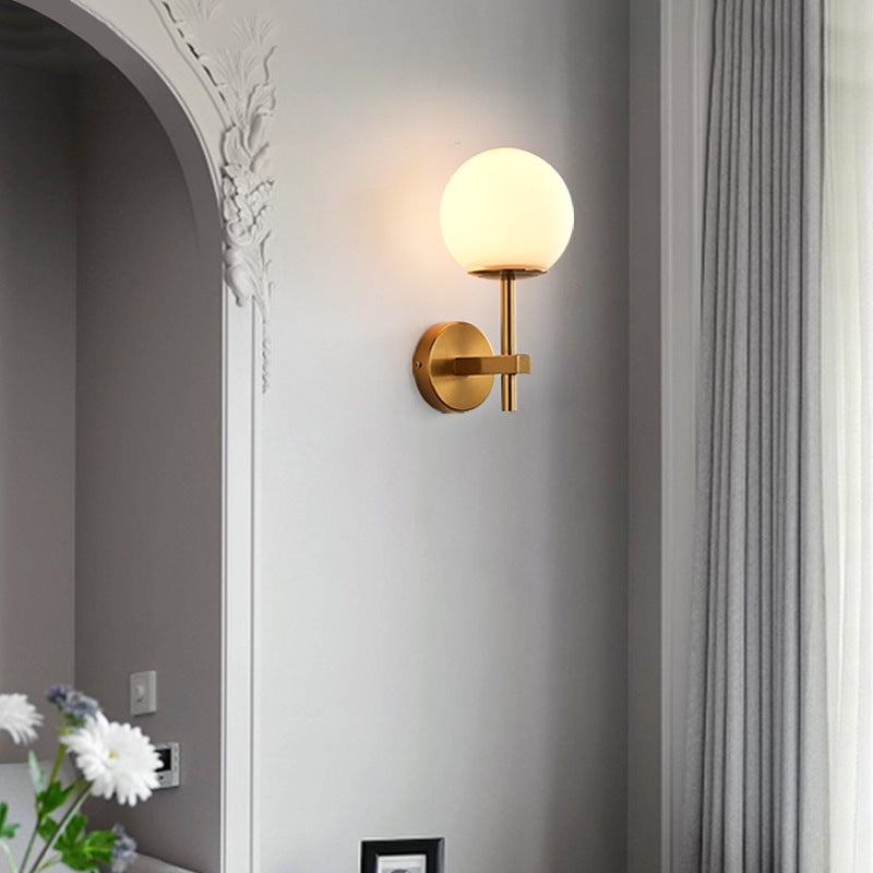 Ösedum Orb Brass Wall Sconce